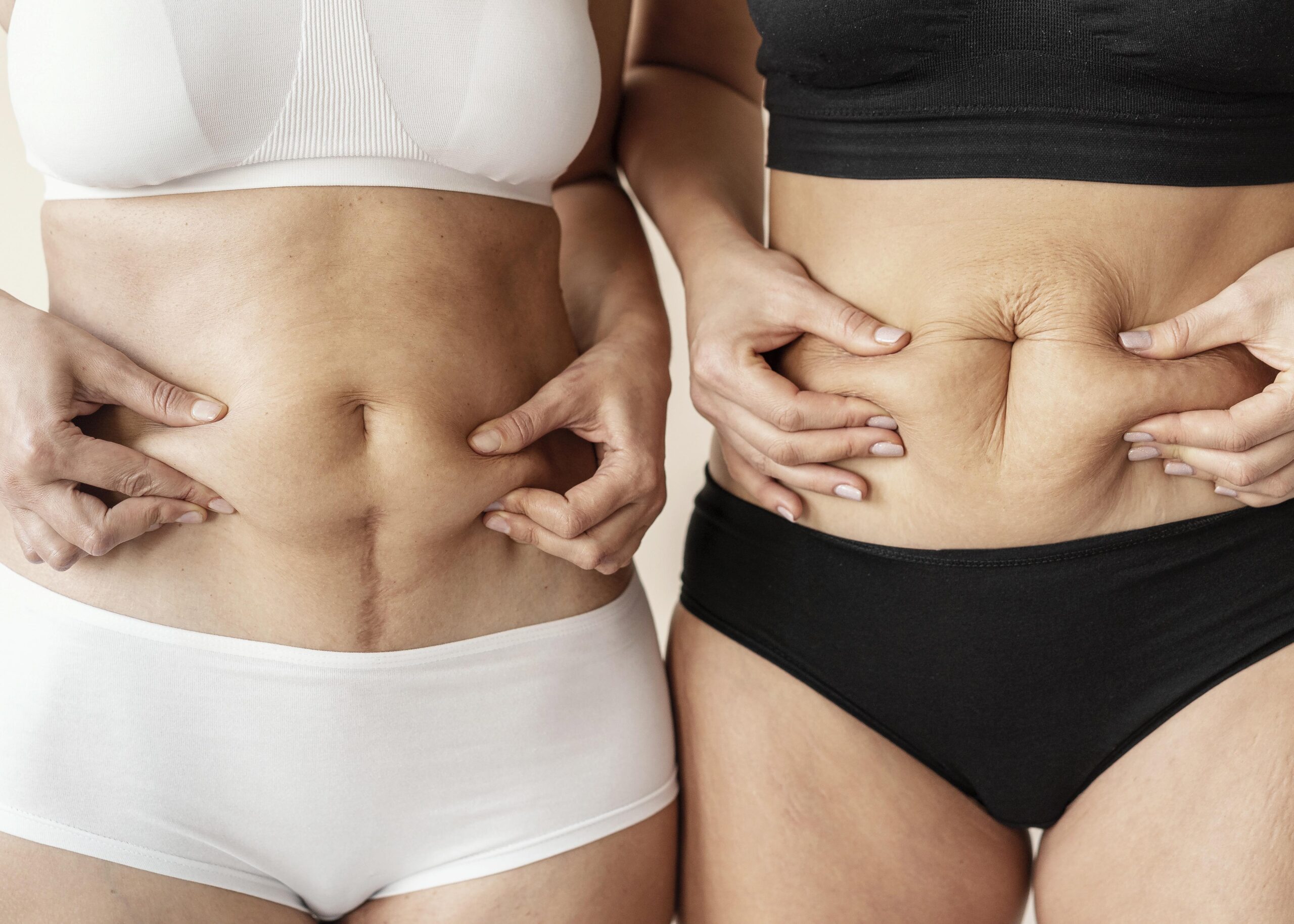 close-up-women-holding-belly